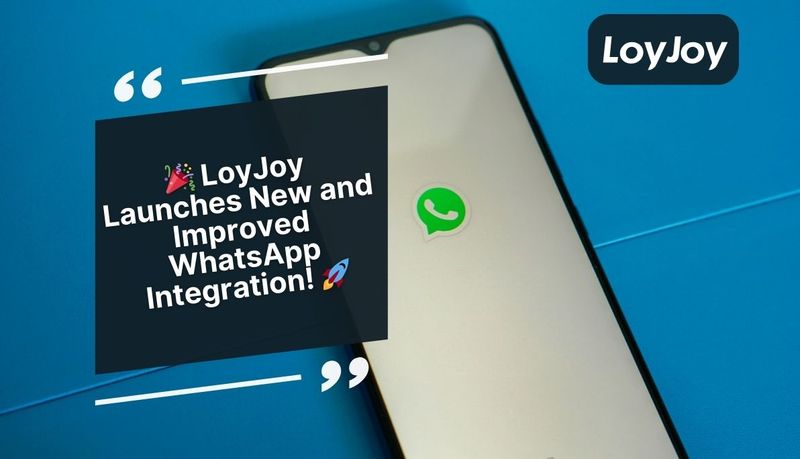 Smartphone with LoyJoy announcement for new WhatsApp integration.